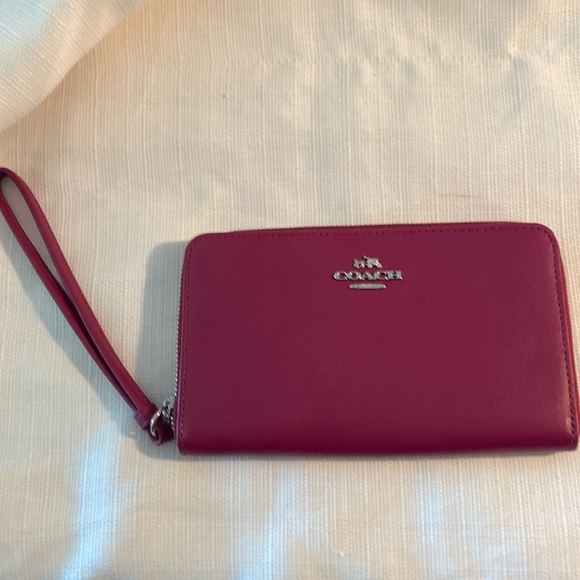 Coach Handbags - Coach Wristlet clutch Wine color NWT